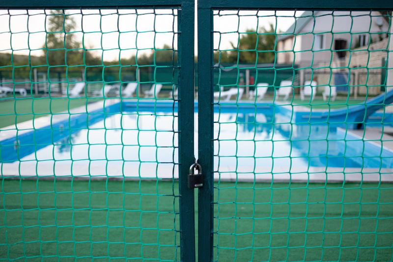 Mesh Fence Secured Around Pool